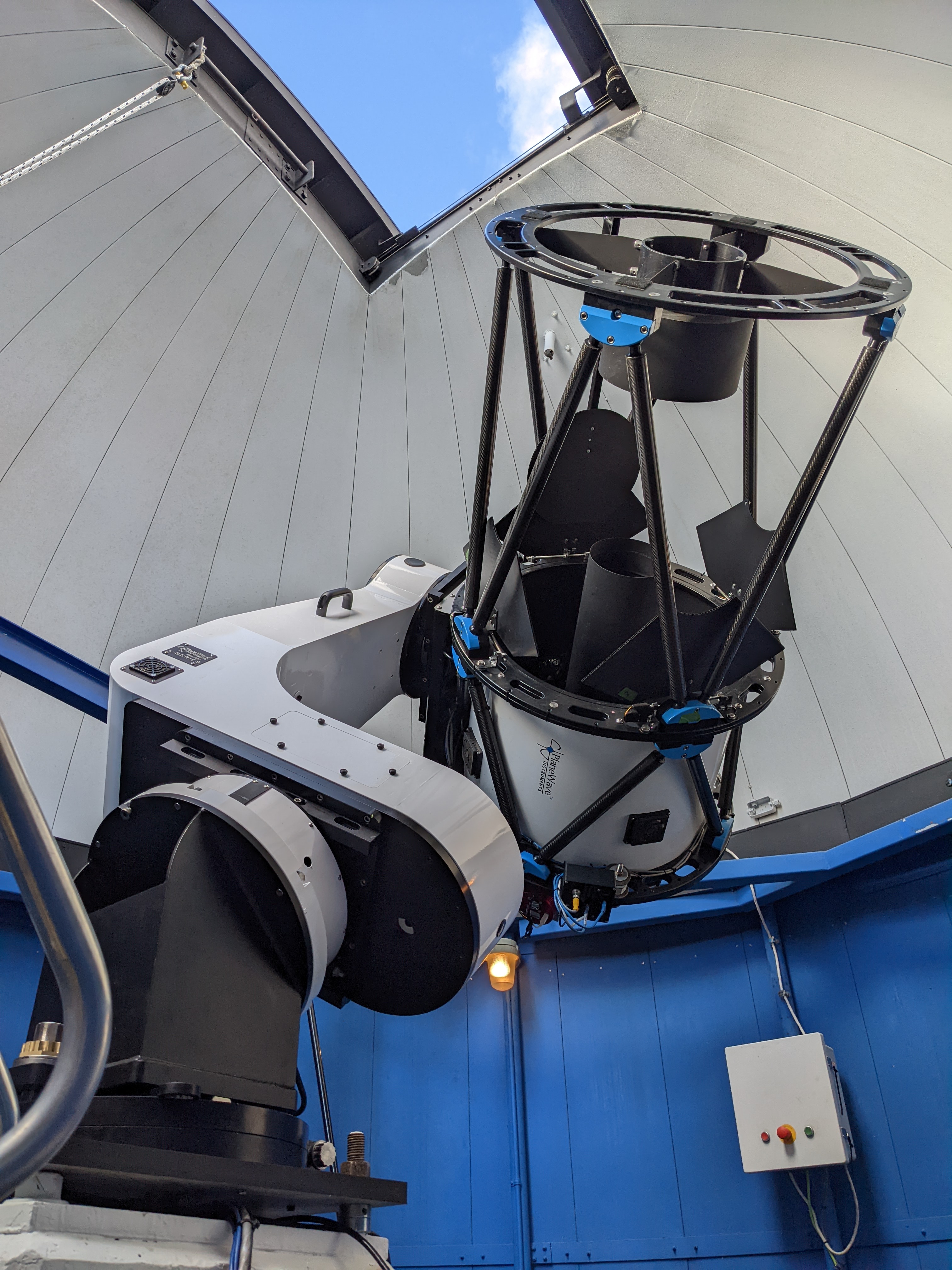 Image of the Dr. Ralph Medjuck Telescope under the sunlight at the Burke-Gaffney Observatory